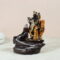 Polyresin Smoke Backflow Fountain Like Waterfall Radha Krishna with 10 Backflow Incense  (Orange)